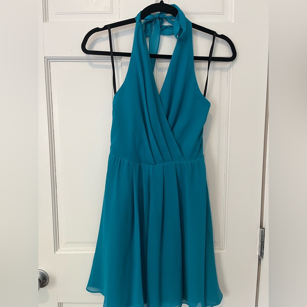 Teal/ Aqua bebe above the knees halter dress. Size small. Like new. - Picture 1 of 2